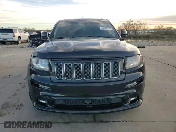 2012 Jeep Grand Cherokee SRT8 with VIN 1C4RJFDJ9CC346867, listed as a Copart auction lot 86349154 with 125,130 mi miles and Salvage Title. Bid and sale history available at carsss.com. Image 14.