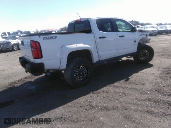 2021 Chevrolet Colorado 4WD Z71 with VIN 1GCGTDEN6M1166282, listed as a IAAI auction lot 40316921 with 35,515 mi miles and . Bid and sale history available at DreamBid. Image 4.