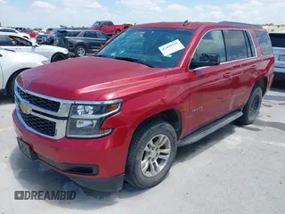2015 Chevrolet Tahoe LS with VIN 1GNSCAEC4FR121571, listed as a IAAI auction lot 42499156 with 131,284 mi miles and . Bid and sale history available at DreamBid. Image 18.