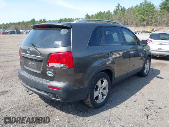 2012 Kia Sorento EX with VIN 5XYKUDA29CG285901, listed as a IAAI auction lot 42072736 with 152,991 mi miles. Bid and sale history available at carsss.com. Image 4.