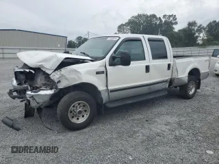 2000 Ford Super Duty F-250 XL with VIN 1FTNW21S1YED90136, listed as a Copart auction lot 71520914 with 378,931 mi miles and Salvage Title. Bid and sale history available at carsss.com. Image 1.