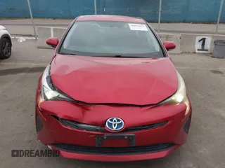 2016 Toyota Prius Two z VIN JTDKBRFU4G3531941, wystawiony jako IAAI lot #42023633 z przebiegiem 249 098 mil mil oraz . Historia ofert i sprzedaży dostępna na DreamBid. Obrazek 12.