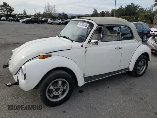 1976 Volkswagen Beetle with VIN 1562109448, listed as a Copart auction lot 48536135 with 10,295 mi miles and Salvage Title. Bid and sale history available at DreamBid. Image 1.