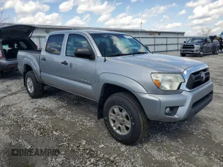 2014 Toyota Tacoma PreRunner with VIN 5TFJU4GN9EX057703, listed as a Copart auction lot 52425505 with 194,884 mi miles and Clean Title. Bid and sale history available at carsss.com. Image 4.