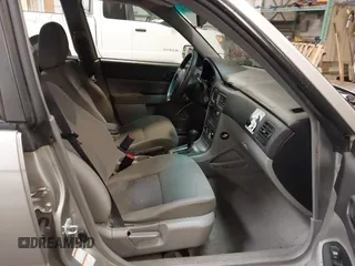 2006 Subaru Forester 2.5 X with VIN JF1SG636X6H712880, listed as a IAAI auction lot 40062211 with 127,537 mi miles. Bid and sale history available at carsss.com. Image 5.