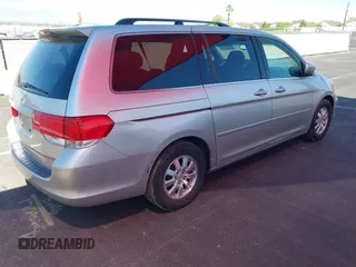 2008 Honda Odyssey EX-L with VIN 5FNRL38758B008724, listed as a IAAI auction lot 42202383 with 199,977 mi miles and . Bid and sale history available at DreamBid. Image 4.