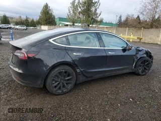 2019 Tesla Model 3 Mid Range with VIN 5YJ3E1EAXKF305080, listed as a Copart auction lot 49899965 with 88,607 mi miles and Salvage Title. Bid and sale history available at DreamBid. Image 3.