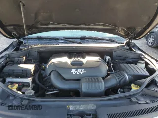 2013 Jeep Grand Cherokee Overland with VIN 1C4RJFCG2DC653207, listed as a Copart auction lot 48680885 with 276,020 mi miles and Salvage Title. Bid and sale history available at carsss.com. Image 12.