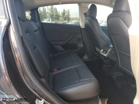 2024 Tesla Model Y with VIN 7SAYGDED4RF032615, listed as a Copart auction lot 43135135 with 2,061 mi miles and Salvage Title. Bid and sale history available at carsss.com. Image 12.