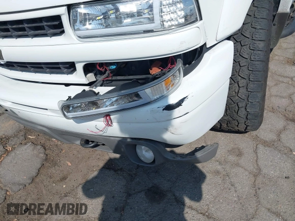 2004 Chevrolet Tahoe Z71 z VIN 1GNEK13Z04R258348, wystawiony jako IAAI lot #42371719 z przebiegiem 125 457 mil mil oraz . Historia ofert i sprzedaży dostępna na DreamBid. Obrazek 14.