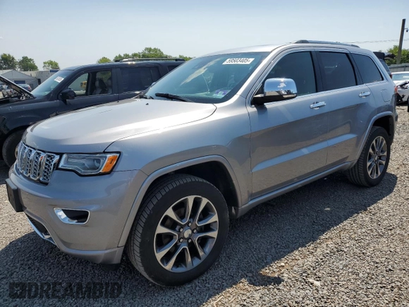 2018 Jeep Grand Cherokee Overland with VIN 1C4RJFCG2JC212947, listed as a Copart auction lot 59503405 with 76,436 mi miles and Clean title. Bid and sale history available at DreamBid. Image 1.