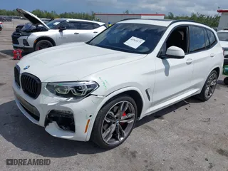 2021 BMW X3 M40i with VIN 5UXTY9C04M9G46876, listed as a IAAI auction lot 41965573 with 112,893 mi miles. Bid and sale history available at carsss.com. Image 2.