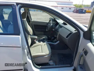 2009 Ford Focus SE with VIN 1FAHP35N19W113864, listed as a IAAI auction lot 42196830 with 192,998 mi miles and . Bid and sale history available at carsss.com. Image 5.