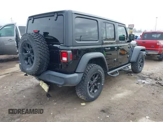 2021 Jeep Wrangler Unlimited Willys with VIN 1C4HJXDN8MW595665, listed as a IAAI auction lot 41507555 with 24,505 mi miles and . Bid and sale history available at DreamBid. Image 4.