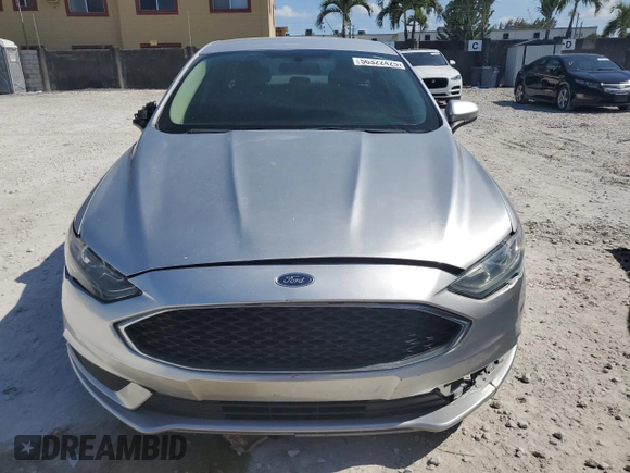 2017 Ford Fusion SE z VIN 3FA6P0H77HR146663, wystawiony jako Copart lot #56322425 z przebiegiem 77 361 mil mil oraz Czysty tytuł • Clean title. Historia ofert i sprzedaży dostępna na DreamBid. Obrazek 5.