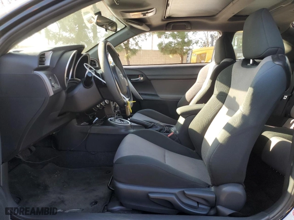 2016 Scion tC with VIN JTKJF5C79GJ020110, listed as a Copart auction lot 86995214 with 79,165 mi miles and Salvage Title. Bid and sale history available at carsss.com. Image 7.