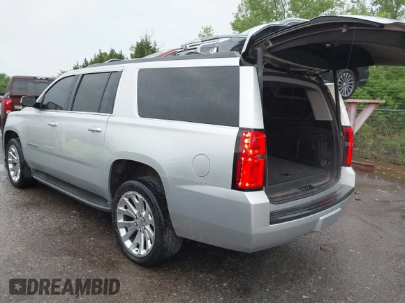 2015 Chevrolet Suburban LT with VIN 1GNSCJKC9FR617227, listed as a IAAI auction lot 42127511 with 167,924 mi miles and . Bid and sale history available at DreamBid. Image 3.