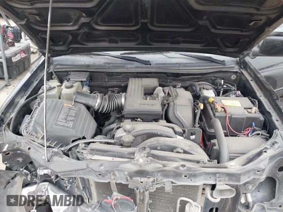 2012 GMC Canyon with VIN 1GTH5PFE0C8162961, listed as a IAAI auction lot 41635311 with 198,553 mi miles and . Bid and sale history available at DreamBid. Image 10.
