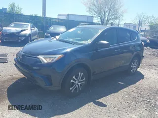 2017 Toyota RAV4 LE with VIN JTMBFREV8HJ168975, listed as a IAAI auction lot 42139354 with 91,394 mi miles and . Bid and sale history available at DreamBid. Image 17.