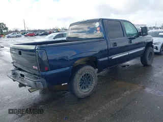 2006 GMC Sierra 1500 SLE1 z VIN 2GTEC13T561238691, wystawiony jako IAAI lot #41579152 z przebiegiem 147 026 mil mil oraz . Historia ofert i sprzedaży dostępna na DreamBid. Obrazek 4.