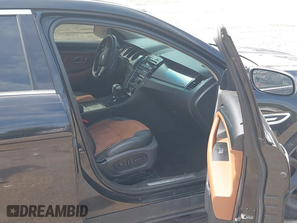 2012 Ford Taurus SHO с VIN 1FAHP2KT6CG143490, выставлен на аукционе IAAI как лот 42235776 с пробегом 125 671 миль миль и . История ставок и продаж доступна на DreamBid. Изображение 5.