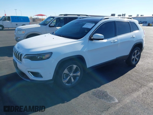 2020 Jeep Cherokee Limited with VIN 1C4PJLDBXLD536346, listed as a IAAI auction lot 41164017 with 35,057 mi miles. Bid and sale history available at carsss.com. Image 2.