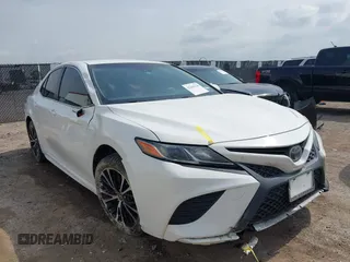 2018 Toyota Camry LE z VIN JTNB11HK6J3010075, wystawiony jako IAAI lot #42259138 z przebiegiem 120 012 mil mil oraz . Historia ofert i sprzedaży dostępna na DreamBid. Obrazek 1.