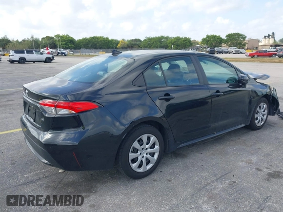 2022 Toyota Corolla LE with VIN 5YFEPMAE6NP348613, listed as a IAAI auction lot 41709618 with 64,406 mi miles and . Bid and sale history available at DreamBid. Image 4.