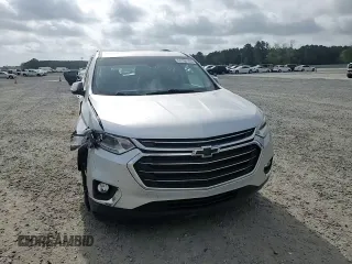 2018 Chevrolet Traverse LT z VIN 1GNEVHKW1JJ210911, wystawiony jako Copart lot #51760145 z przebiegiem 87 181 mil mil oraz Szkoda całkowita • Salvage title. Historia ofert i sprzedaży dostępna na DreamBid. Obrazek 11.