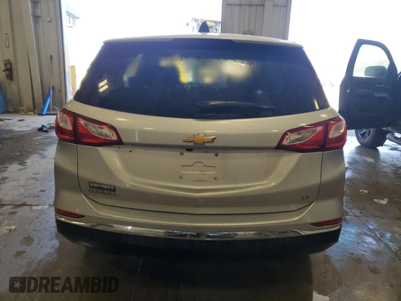 2018 Chevrolet Equinox LT z VIN 3GNAXJEV3JL104472, wystawiony jako Copart lot #55535805 z przebiegiem 119 748 mil mil oraz Czysty tytuł • Clean title. Historia ofert i sprzedaży dostępna na DreamBid. Obrazek 6.