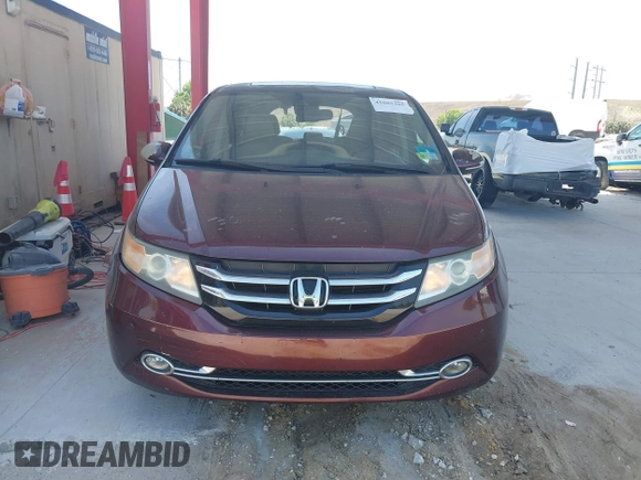 2014 Honda Odyssey Touring with VIN 5FNRL5H90EB080889, listed as a IAAI auction lot 42085305 with 123,286 mi miles and . Bid and sale history available at carsss.com. Image 12.