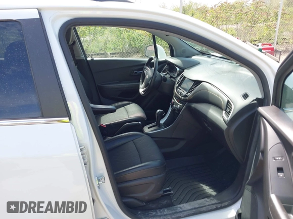 2020 Chevrolet Trax LT with VIN KL7CJPSB5LB002799, listed as a IAAI auction lot 42247119 with 92,459 mi miles and . Bid and sale history available at DreamBid. Image 5.
