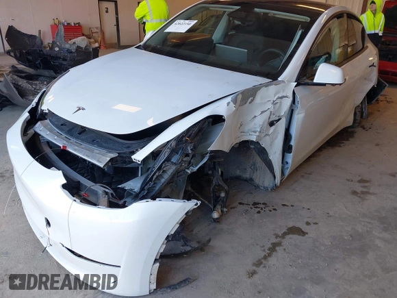 2024 Tesla Model Y Long Range z VIN 7SAYGDEE7RA294649, wystawiony jako IAAI lot #42022150 z przebiegiem 9 110 mil mil oraz . Historia ofert i sprzedaży dostępna na DreamBid. Obrazek 6.