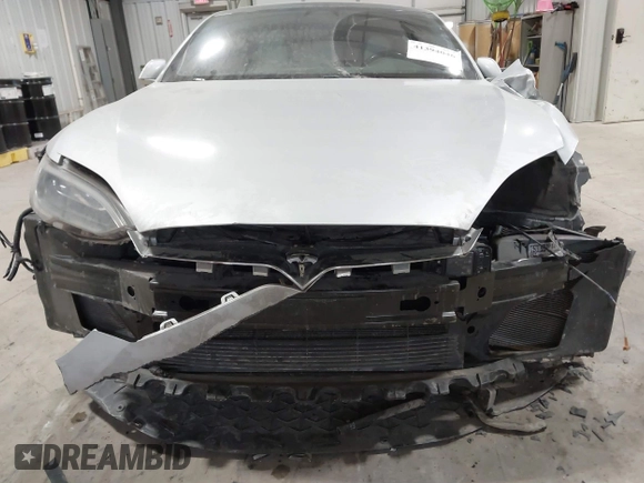 2017 Tesla Model S 100D with VIN 5YJSA1E23HF232059, listed as a IAAI auction lot 41394046 with 84,052 mi miles and . Bid and sale history available at DreamBid. Image 13.