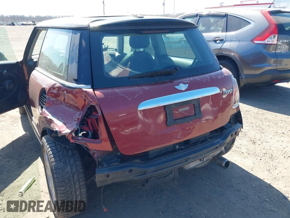 2007 MINI Hardtop with VIN WMWMF33537TU60428, listed as a IAAI auction lot 41753810 with 218,137 mi miles and . Bid and sale history available at DreamBid. Image 6.