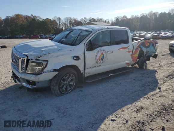 2019 Nissan Titan XD SL with VIN 1N6BA1F43KN511419, listed as a Copart auction lot 77875274 with 27,447 mi miles and Salvage Title. Bid and sale history available at carsss.com. Image 1.