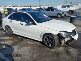 2012 Mercedes-Benz C C 63 AMG with VIN WDDGF7HB2CA661318, listed as a IAAI auction lot 41841635 with 125,085 mi miles. Bid and sale history available at carsss.com. Image 1.