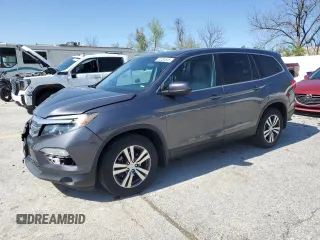 2018 Honda Pilot EX-L with VIN 5FNYF6H57JB047453, listed as a Copart auction lot 52334615 with 80,986 mi miles and Salvage title. Bid and sale history available at DreamBid. Image 1.
