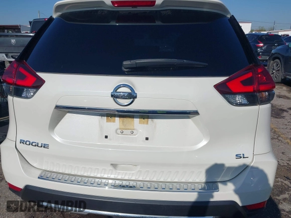 2018 Nissan Rogue S with VIN JN8AT2MT4JW469784, listed as a IAAI auction lot 41827157 with 67,838 mi miles and . Bid and sale history available at carsss.com. Image 15.