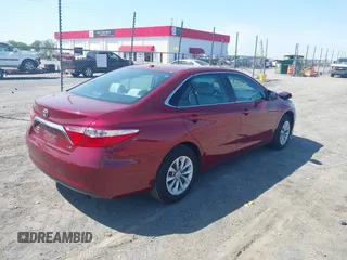 2016 Toyota Camry XLE with VIN 4T1BF1FK1GU506974, listed as a IAAI auction lot 41991611 with 102,451 mi miles and . Bid and sale history available at DreamBid. Image 4.