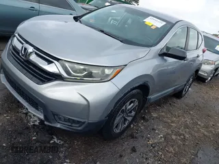 2018 Honda CR-V LX with VIN 2HKRW5H35JH401453, listed as a IAAI auction lot 41931225 with 106,854 mi miles and . Bid and sale history available at carsss.com. Image 2.