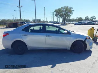 2014 Toyota Corolla L with VIN 2T1BURHE5EC006925, listed as a IAAI auction lot 40917569 with 130,761 mi miles and . Bid and sale history available at DreamBid. Image 13.