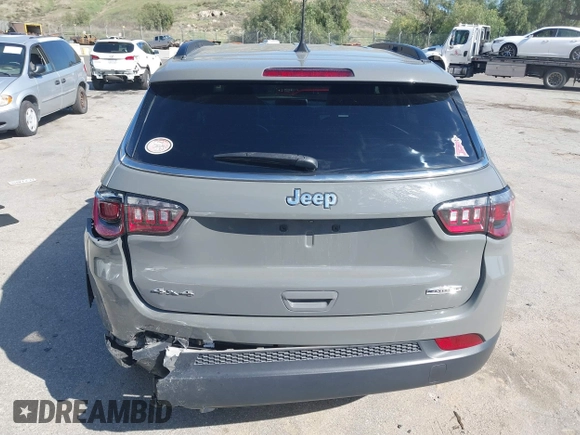 2023 Jeep Compass Latitude with VIN 3C4NJDBN5PT540444, listed as a IAAI auction lot 41820993 with 47,516 mi miles and . Bid and sale history available at DreamBid. Image 16.