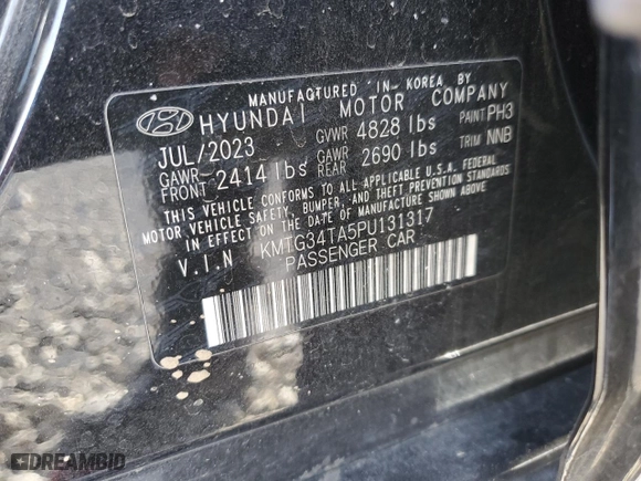 2023 Genesis G70 2.0T with VIN KMTG34TA5PU131317, listed as a Copart auction lot 42138475 with 34,189 mi miles and Salvage Title. Bid and sale history available at carsss.com. Image 14.