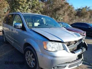 2011 Chrysler Town & Country Touring L with VIN 2A4RR8DGXBR714238, listed as a IAAI auction lot 41283027 with 205,498 mi miles and . Bid and sale history available at carsss.com. Image 1.