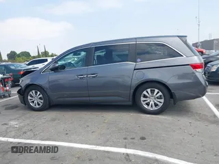 2014 Honda Odyssey EX-L with VIN 5FNRL5H64EB026520, listed as a IAAI auction lot 42562290 with 118,890 mi miles and . Bid and sale history available at DreamBid. Image 14.