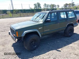 1998 Jeep Cherokee Sport with VIN 1J4FJ68S9WL189992, listed as a IAAI auction lot 42039822 with 156,006 mi miles. Bid and sale history available at carsss.com. Image 2.