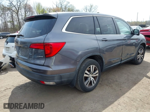 2016 Honda Pilot EX-L with VIN 5FNYF6H53GB004091, listed as a IAAI auction lot 42002063 with 173,009 mi miles. Bid and sale history available at carsss.com. Image 4.