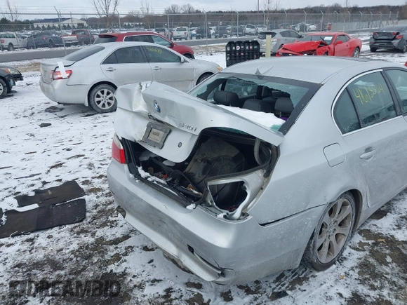 2004 BMW 5 Series 530i with VIN WBANA73524B047329, listed as a IAAI auction lot 41613554 with 240,000 mi miles and . Bid and sale history available at carsss.com. Image 6.