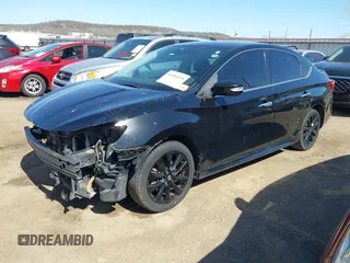 2018 Nissan Sentra S with VIN 3N1AB7AP2JY275642, listed as a IAAI auction lot 41684218 with 128,852 mi miles and . Bid and sale history available at DreamBid. Image 21.